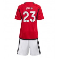 Manchester United Luke Shaw #23 Heimtrikotsatz Kinder 2023-24 Kurzarm (+ Kurze Hosen)